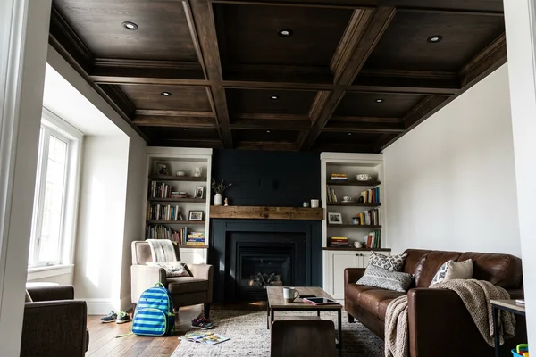 Waffle ceiling with symmetrical small-aperture downlights